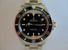 14060M Rolex Submariner overhaul and insurance valuation Photo